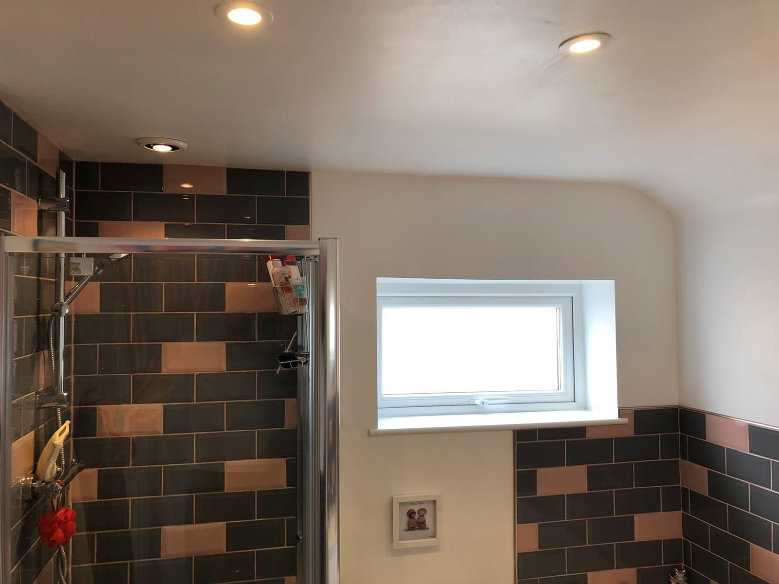 Bathroom with fire-rated downlights and extractor